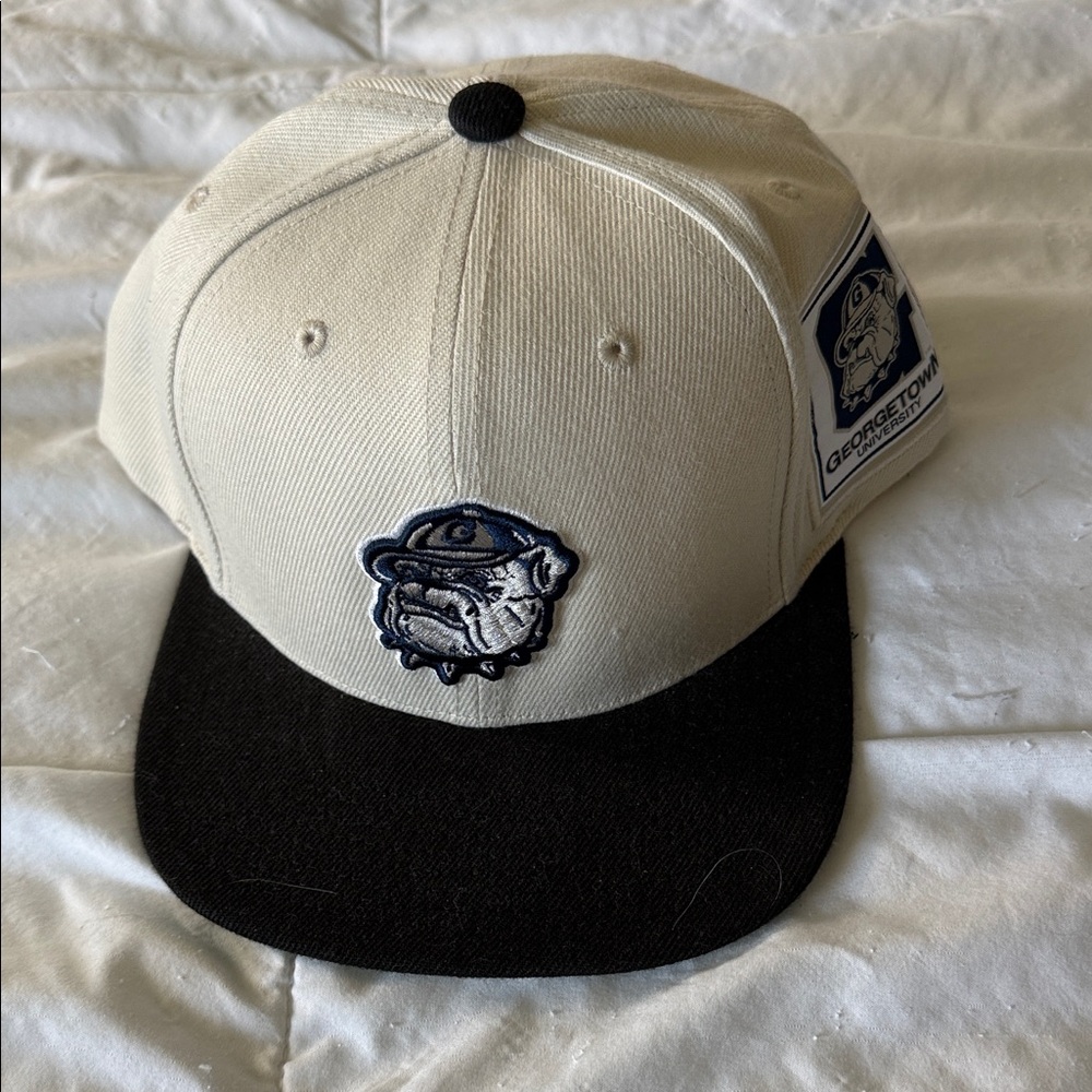 Mitchell & Ness Cream and Black Georgetown Bulldog Patch Hat